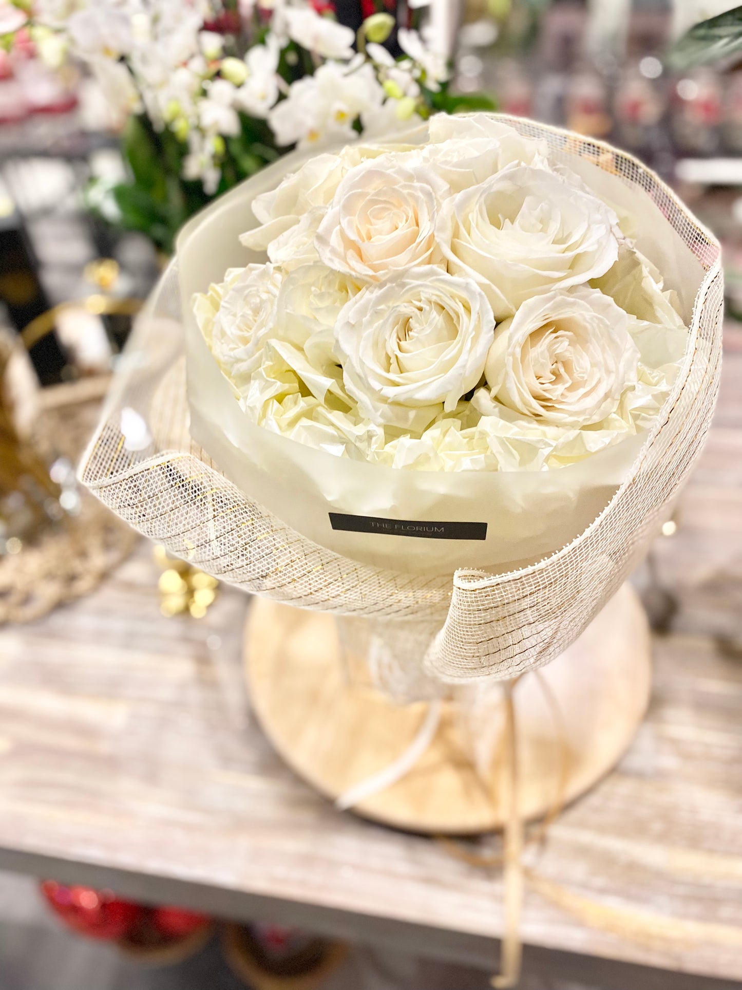 White Fresh Roses in Special Wrapping